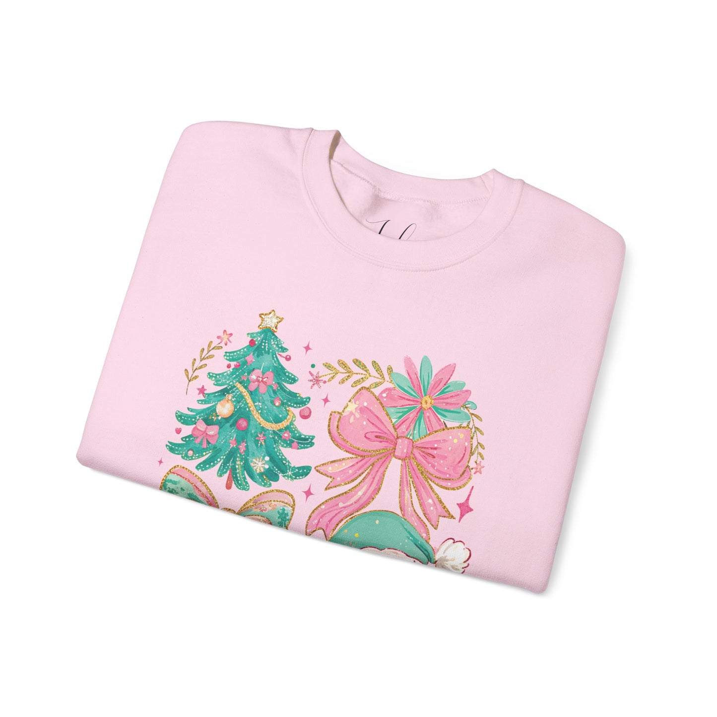 Pink folded crewneck showcasing pastel floral Christmas tree and Santa illustration.