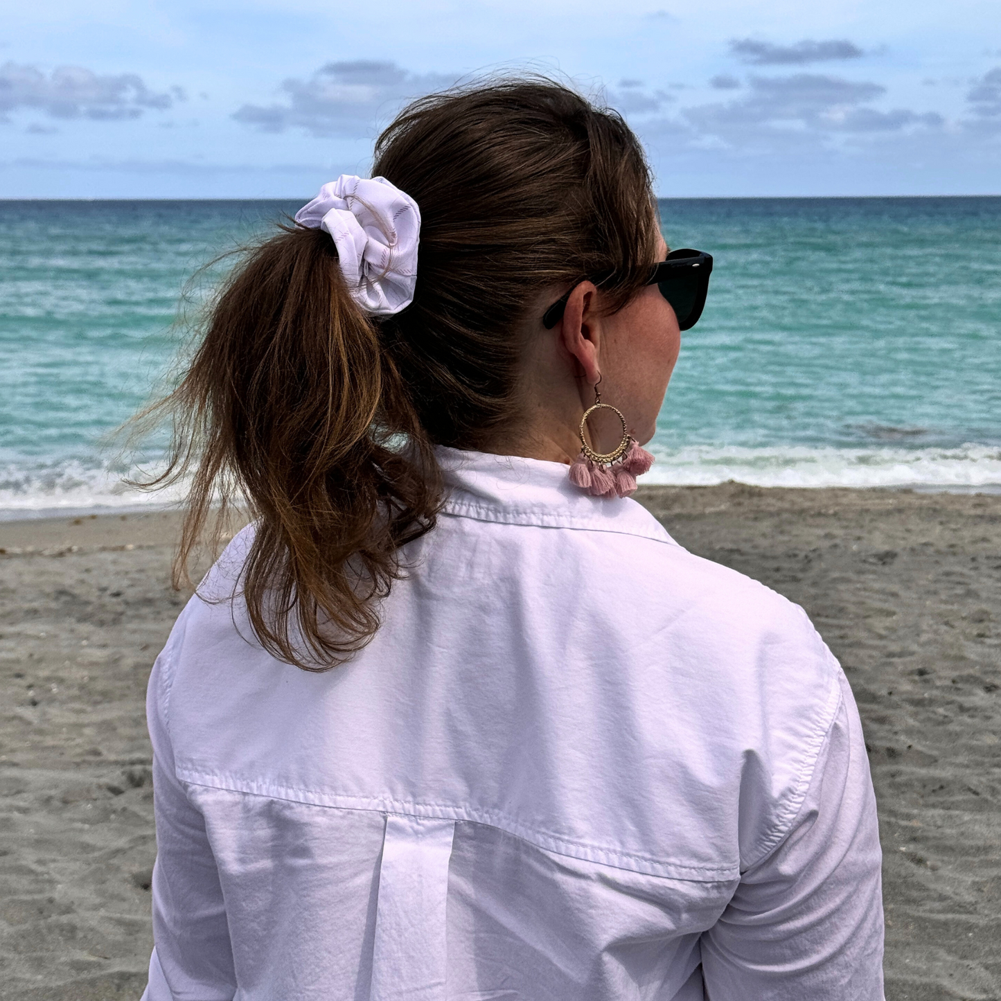 Model wearing School Day Classic scrunchie at the beach