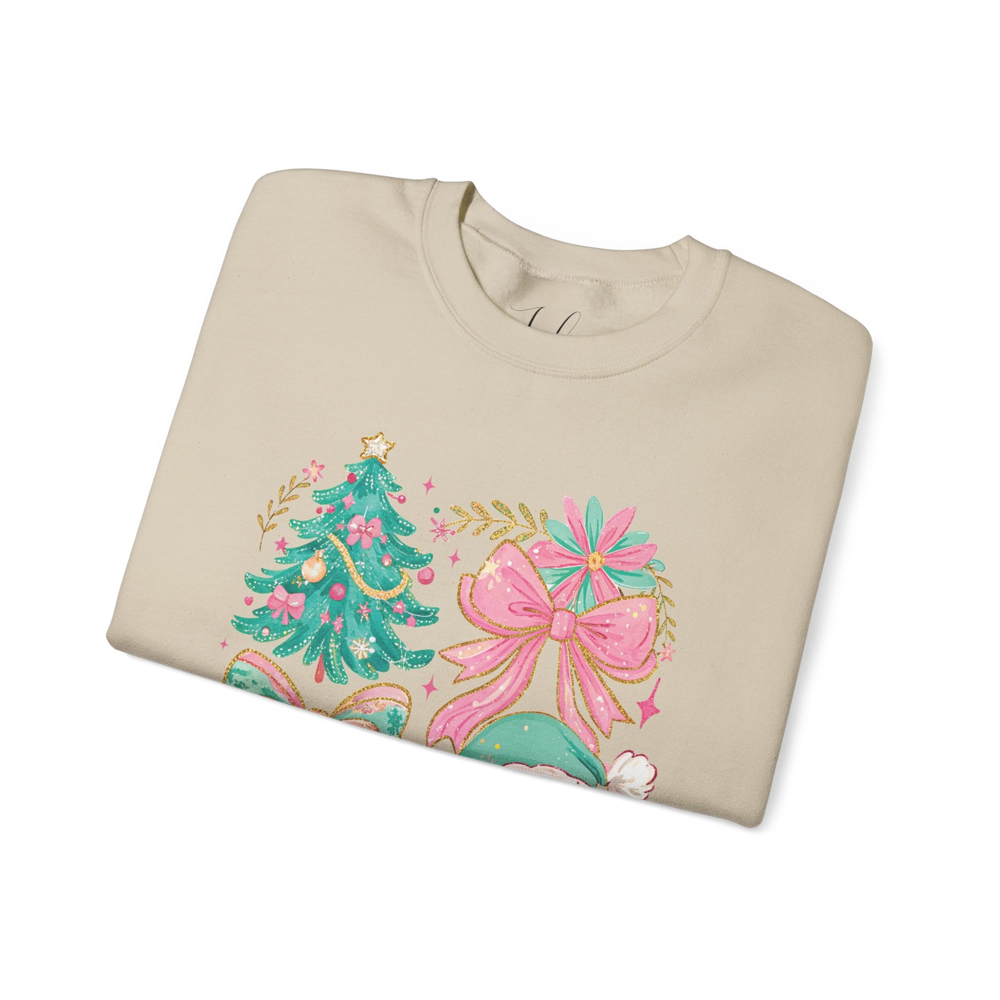 Sand crewneck folded to display pastel Santa and floral Christmas tree artwork.