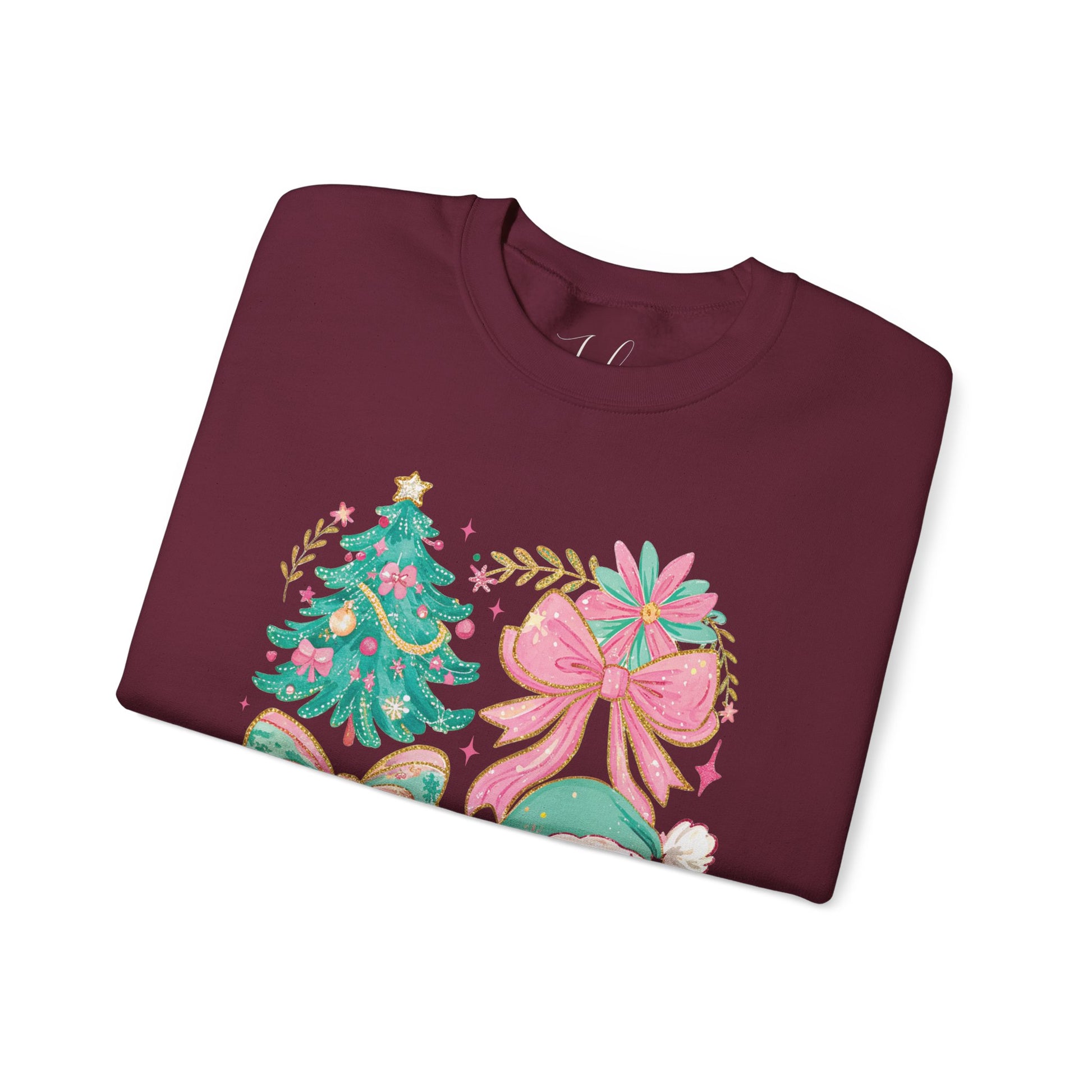 Maroon folded crewneck with pastel Santa and floral Christmas tree graphic.