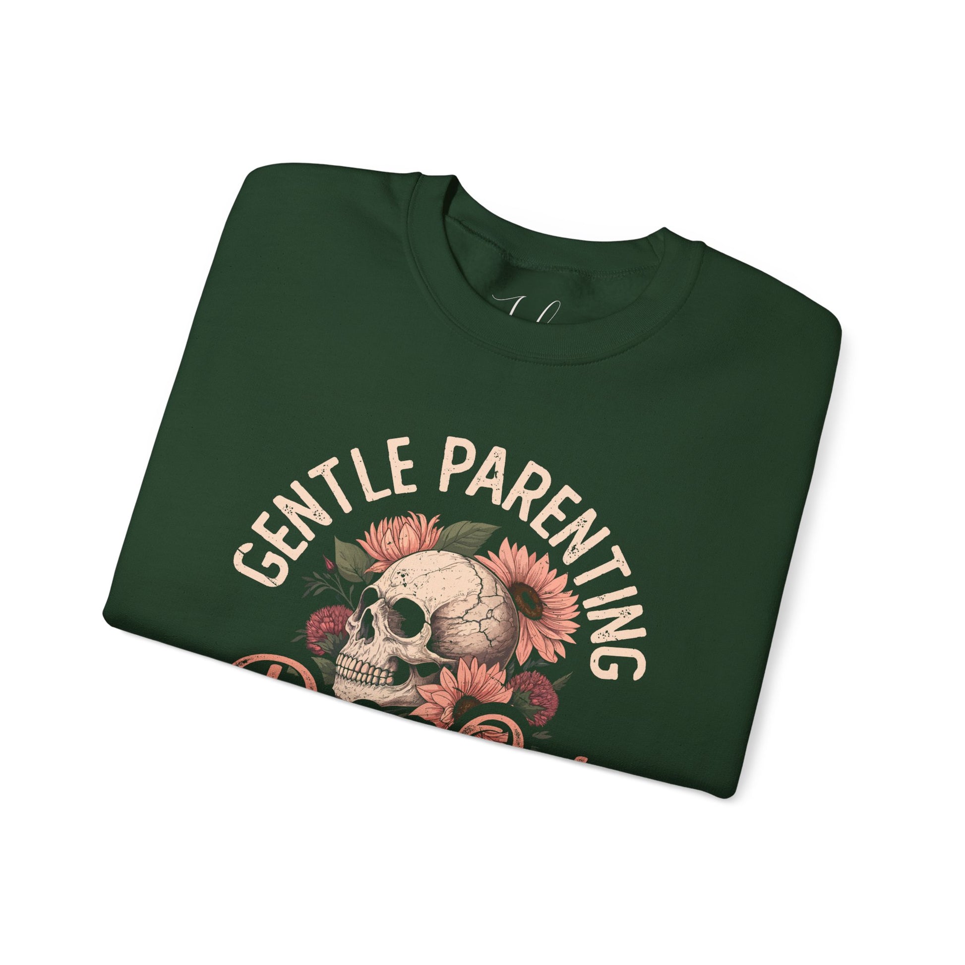 Green folded crewneck with floral skull and “Gentle Parenting Drop Out” print.