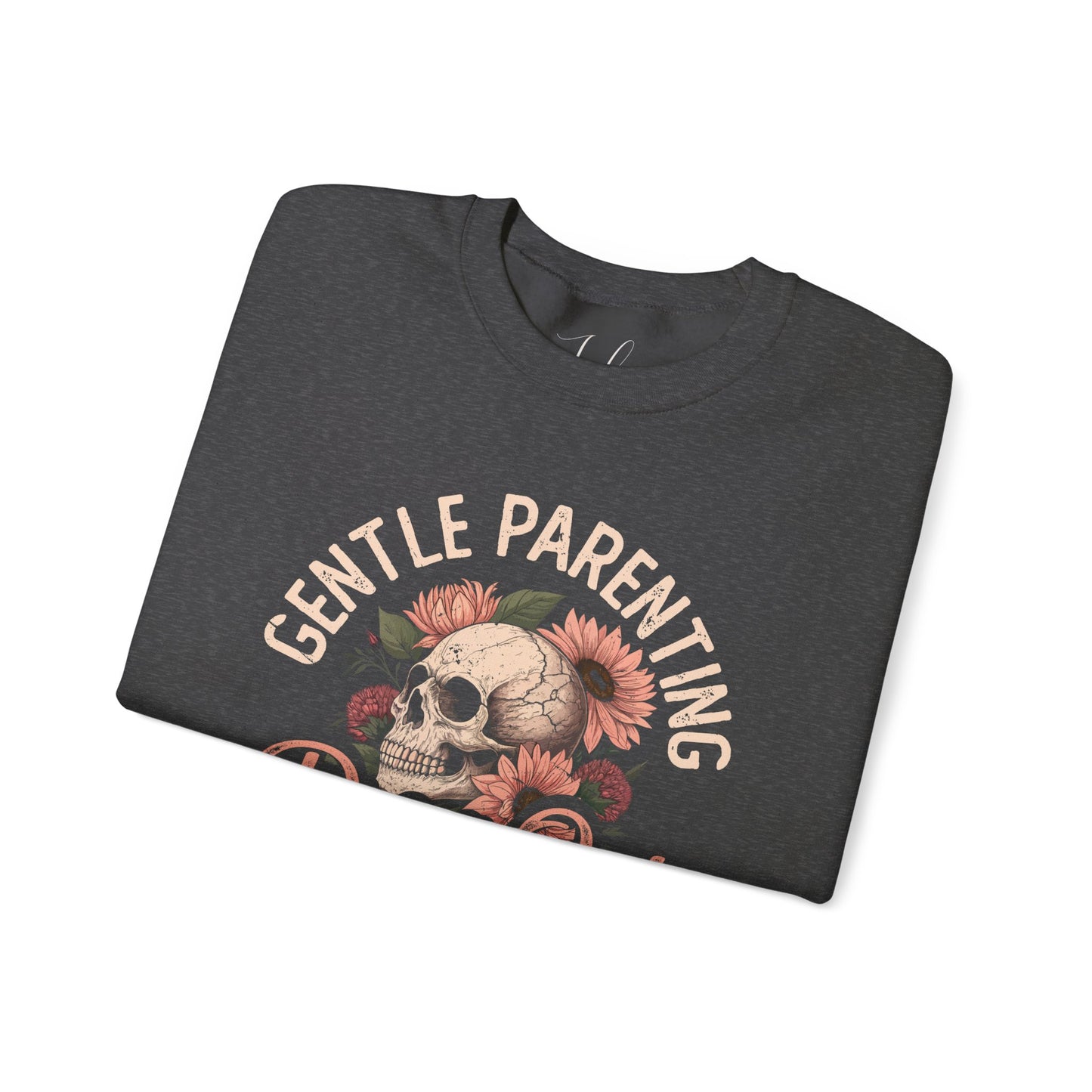 Gray folded crewneck with floral skull and “Gentle Parenting Drop Out” graphic.